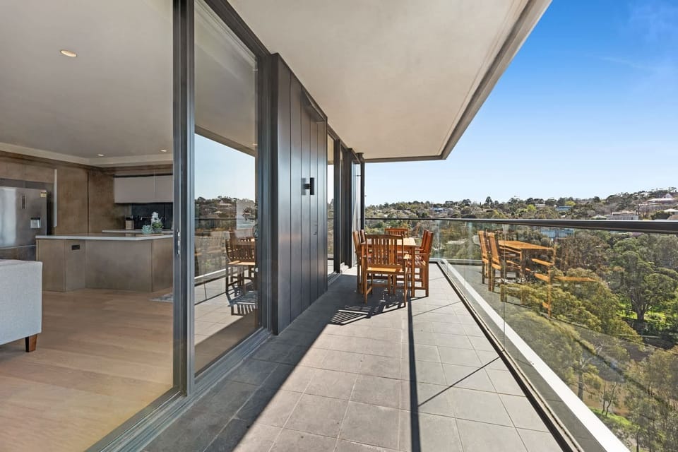 This patio offers a perfect blend of comfort, natural beauty, and functionality, making it an ideal spot to unwind and connect.