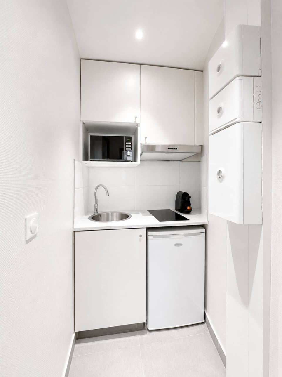 Bright Modern Kitchen with All Essentials: Microwave, Nespresso Machine, and many more