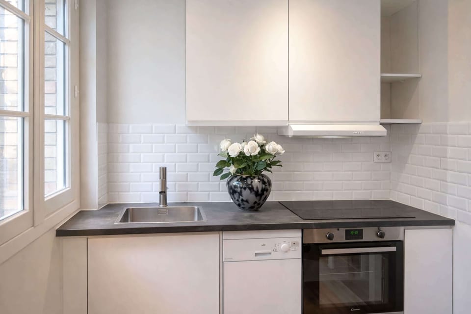 Fully functional kitchen with all appliances and utensils ready for your use.