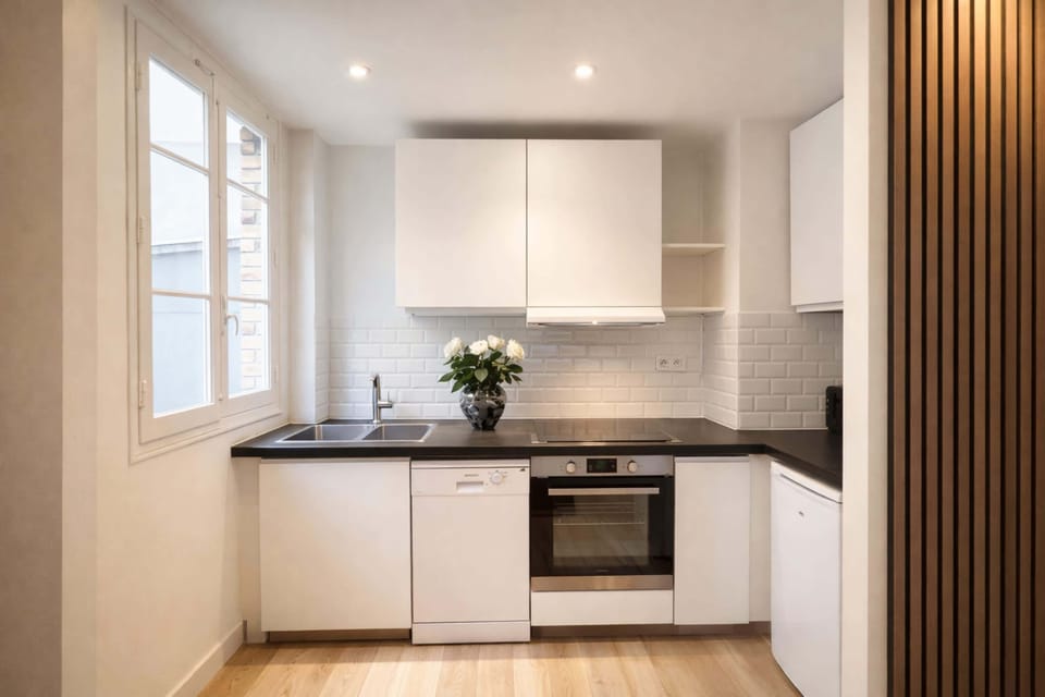 Functional kitchen stocked with utensils and appliances for a stress-free stay.