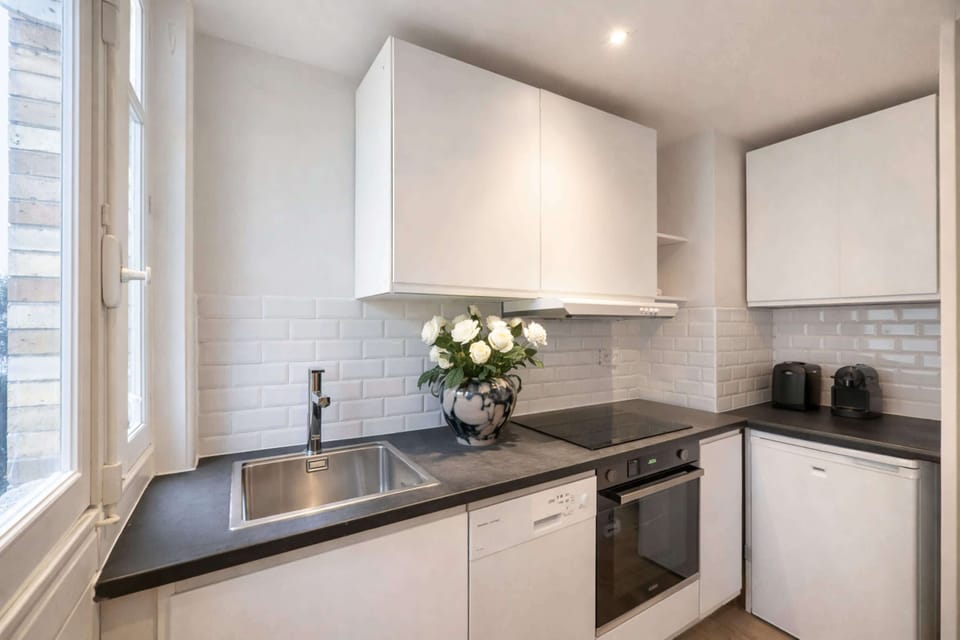 Functional kitchen stocked with utensils and appliances for a stress-free stay.
