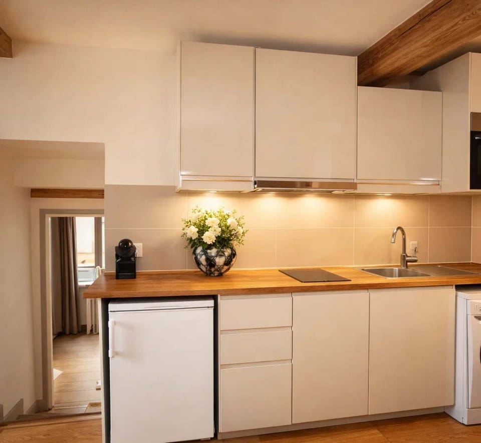 The kitchen is fully equipped, washer included