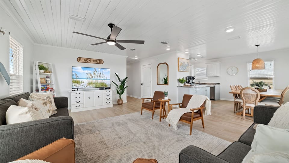 This inviting area seamlessly blends comfort and style, perfect for family gatherings and creating cherished memories.