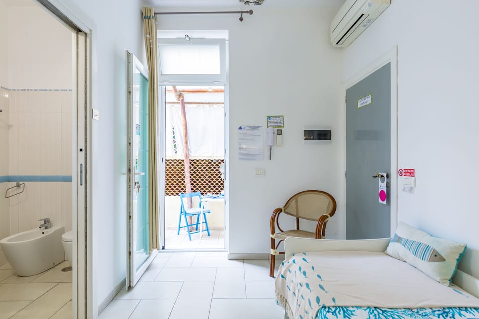 Room (Terra) | Blackout drapes, free WiFi, bed sheets