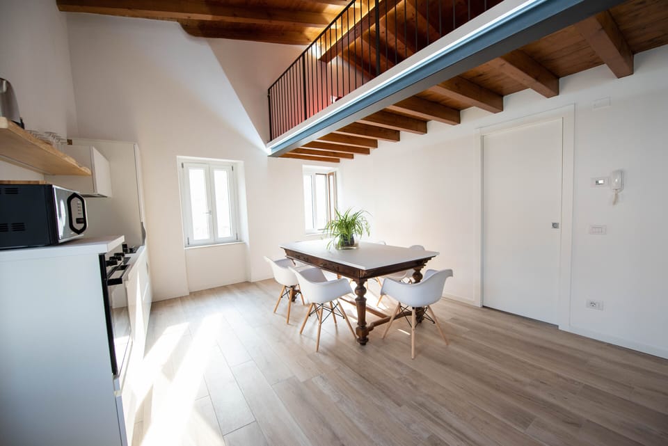 Deluxe Apartment | Living area | 50-inch flat-screen TV with digital channels, TV