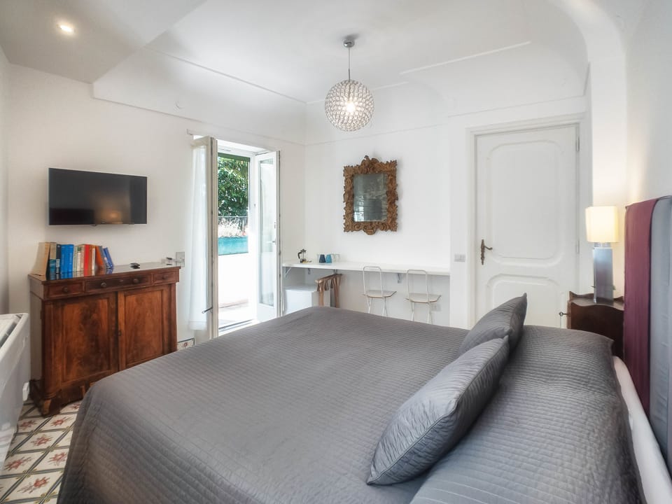 Comfort Double Room (Paola) | Down comforters, minibar, in-room safe, individually decorated
