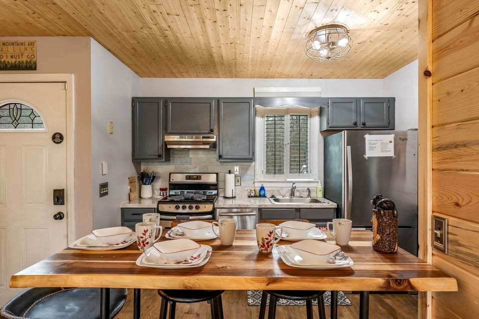 Fully stocked kitchen.  Hand made live edge table.