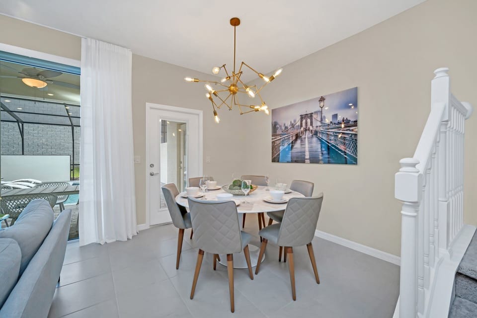 A unique fixture right above this six seater dining table will give you a good lighting for a nice dining experience.