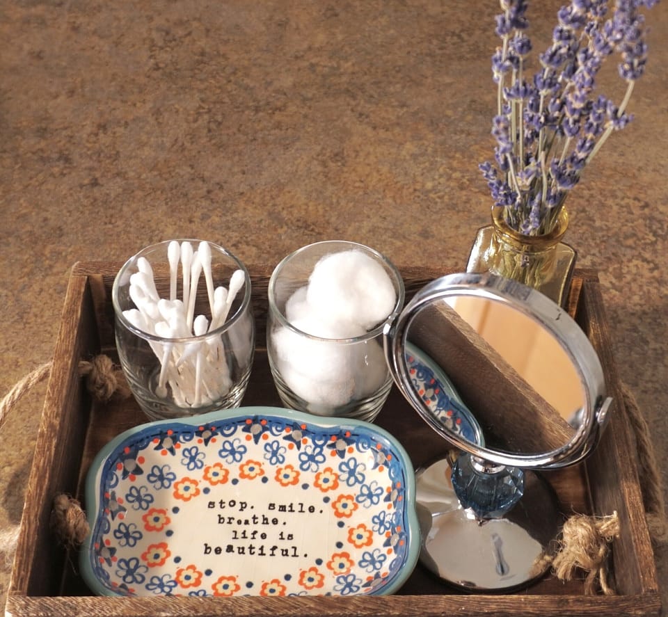 Qtips, cotton balls, spare toothbrushes and toothpaste, blow dryer, curling iron