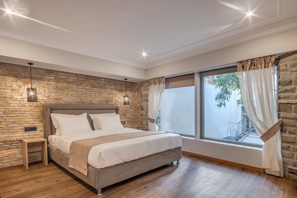 Family Suite, Patio, Garden View (Two-levels) | Egyptian cotton sheets, premium bedding, memory foam beds, in-room safe