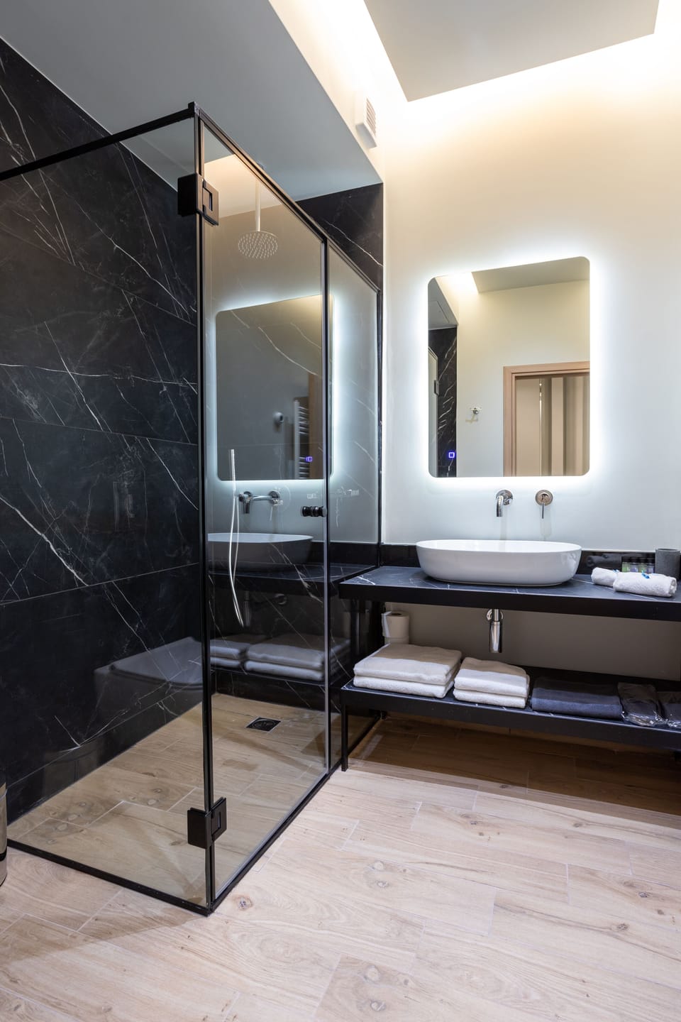Deluxe Triple Room, Courtyard View | Bathroom | Shower, free toiletries, hair dryer, bathrobes