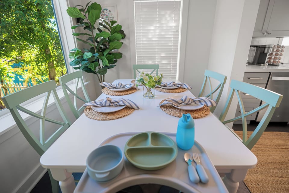 Dining area with kids high chair & eating set