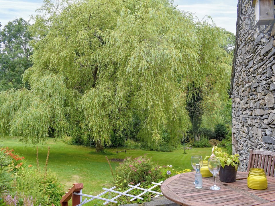 Garden and grounds | Willow Cottage, Spark Bridge, near Ulvertson