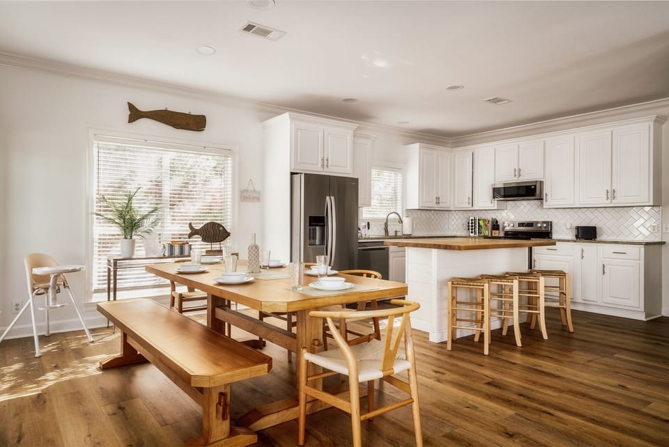 A spacious kitchen and dining area perfect for cooking, connecting, and relaxing.