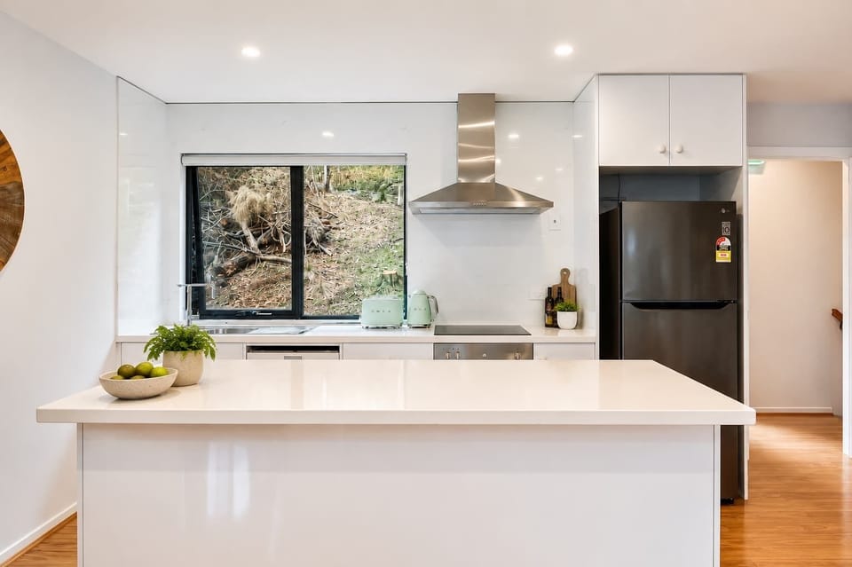 A second fully equipped kitchen makes the upstairs retreat ideal for families travelling together.