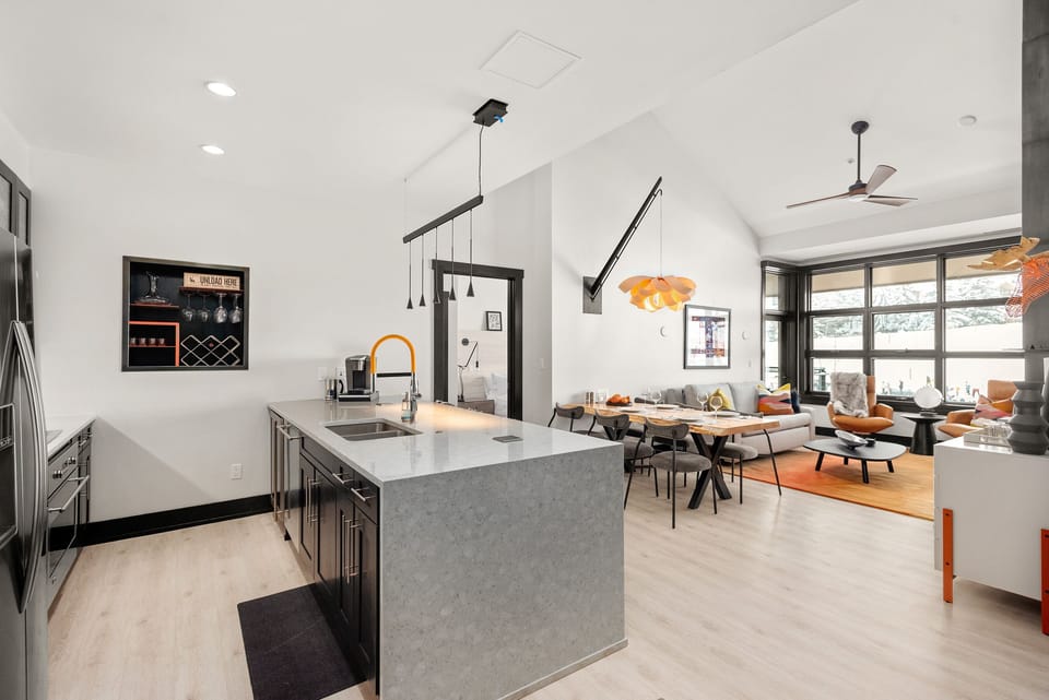 Kitchen and Main Living Area with Vaulted Ceilings, Wine Rack, Views of the Slopes