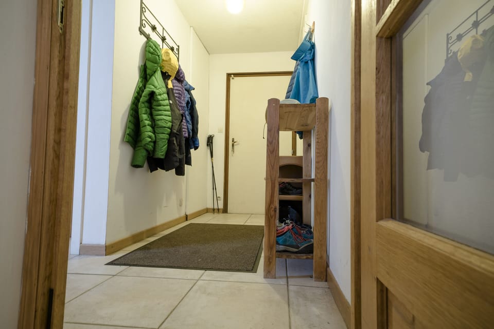 Entrance Hallway. Plenty of coat hooks and shelves for shoes.