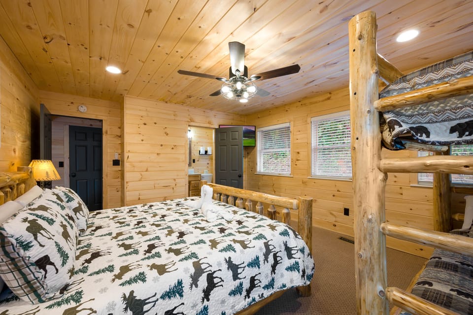 King Suite! Full bathroom, king bed, HDTV, twin bunk beds make a perfect retreat