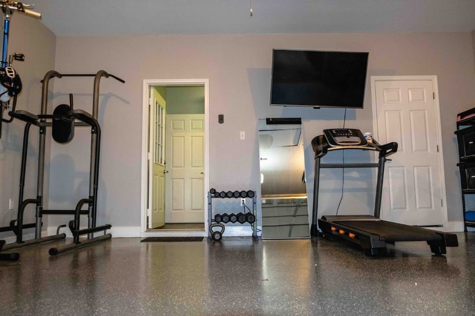Gym in the garage with smart TV