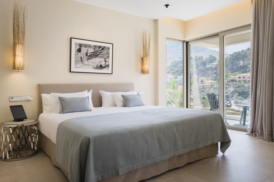 Suite, Balcony, Partial Sea View | Premium bedding, minibar, in-room safe, individually decorated