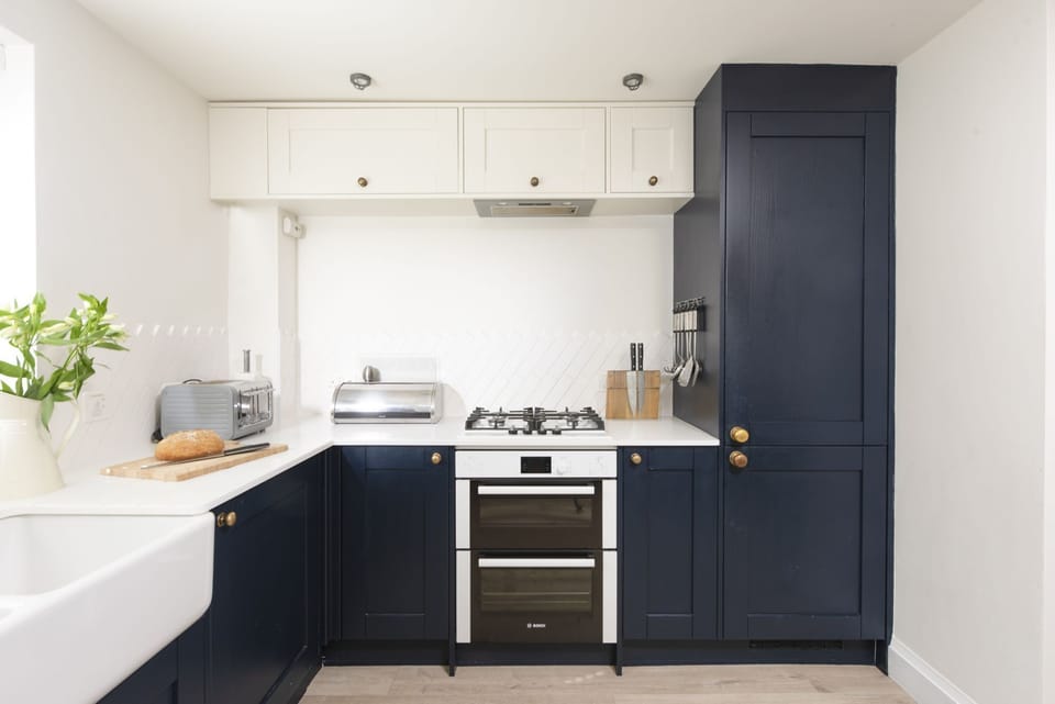 Fridge, freezer in kitchen with oven - Emerald