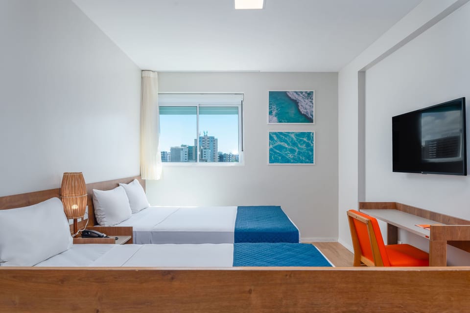 Family Room, 2 Double Beds | Minibar, in-room safe, desk, blackout drapes