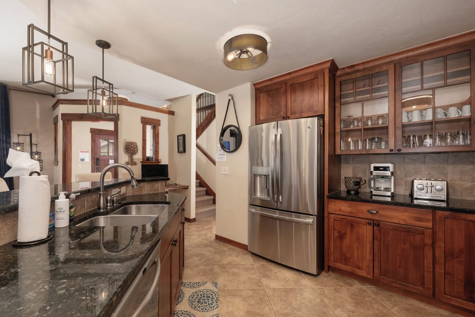 - Modern kitchen with fridge, dishwasher, and coffee station   - Plenty of storage and counter space for group meal prep   - Convenient setup for longer stays near mountain activities