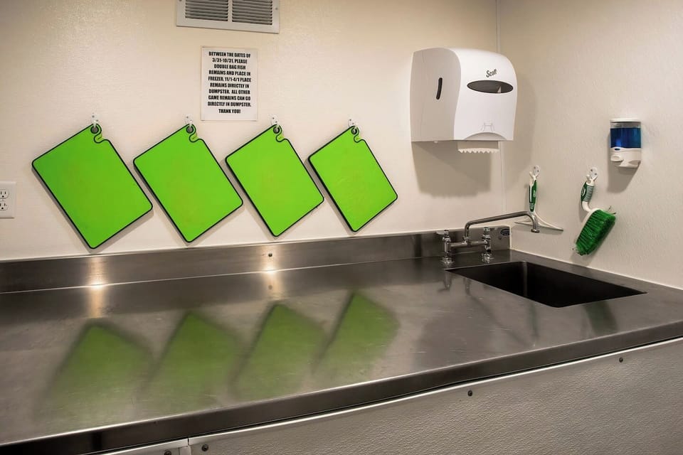 Climate controlled game cleaning room