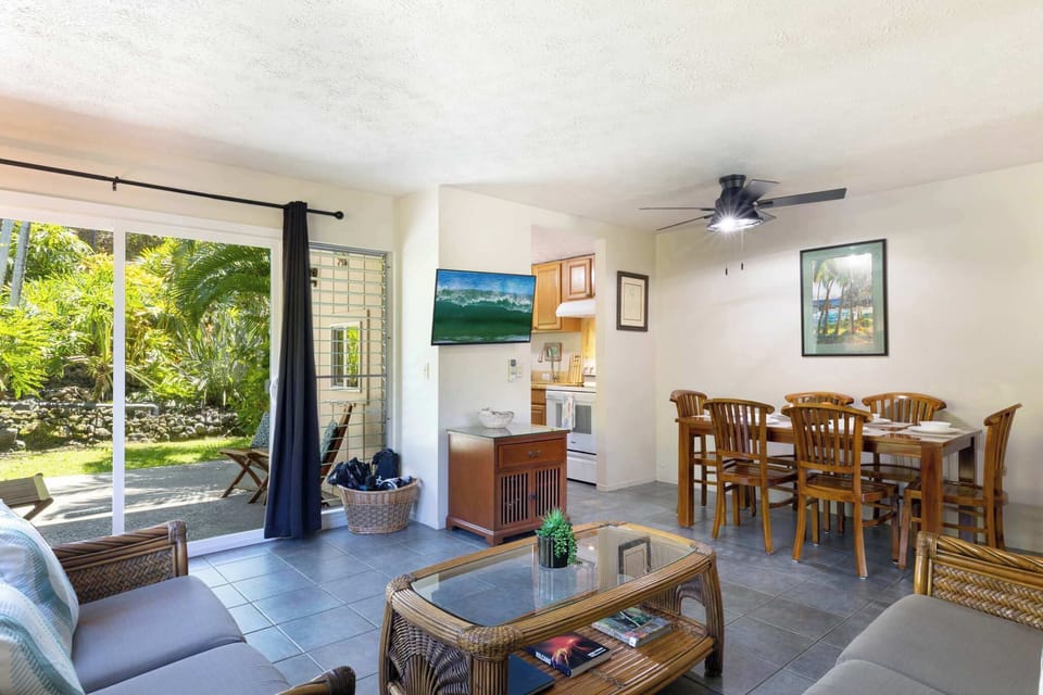 Townhome, Multiple Beds, Patio, Garden View (Surf & Racquet Club #24) | Living area | 42-inch flat-screen TV with digital channels