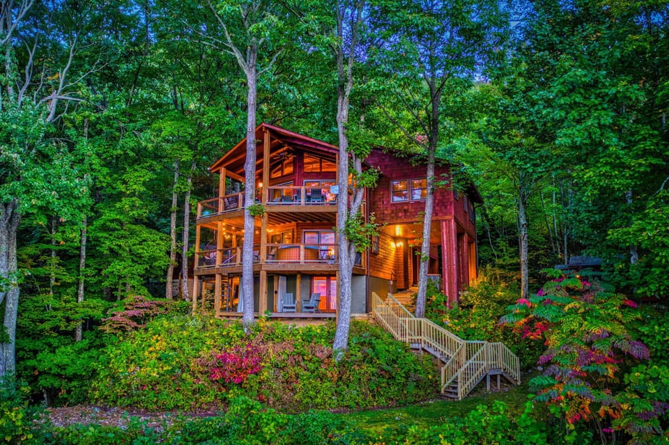 Nestled in the trees. Enjoy 3 levels of spectacular views!