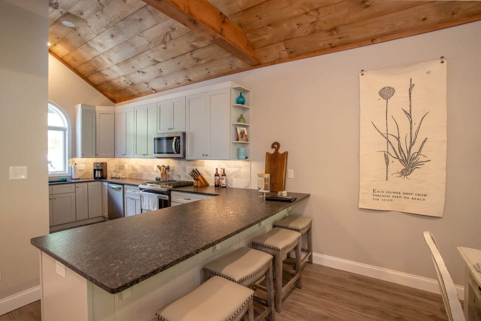 Kitchen and seating at the bar top