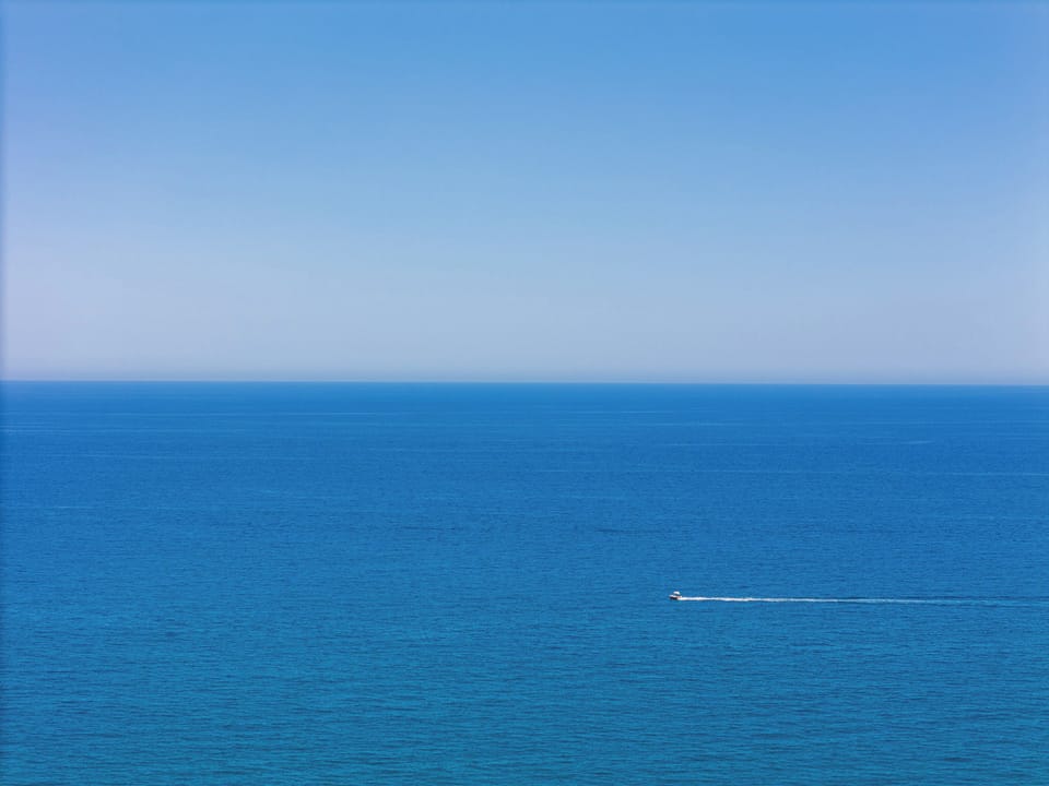 The sandy beach is just 150 m away from the villa!