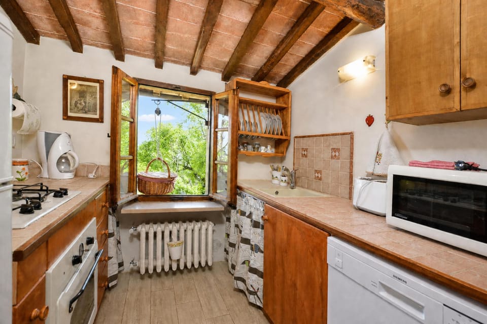 Family House, 2 Bedrooms, 2 Bathrooms, Mountainside (Il Fortino) | Private kitchen | Coffee/tea maker, microwave, oven, stovetop