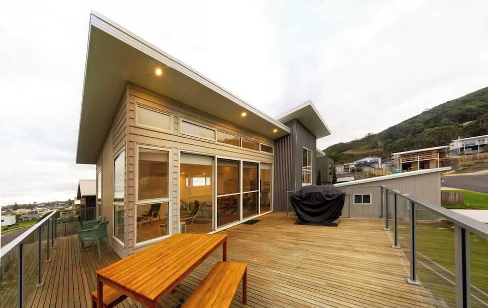 Gorgeous, architecturally designed, contemporary home with wrap around deck for entertaining.