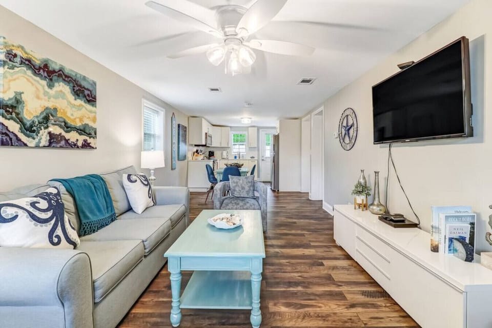 Open concept living room, dining room, and kitchen