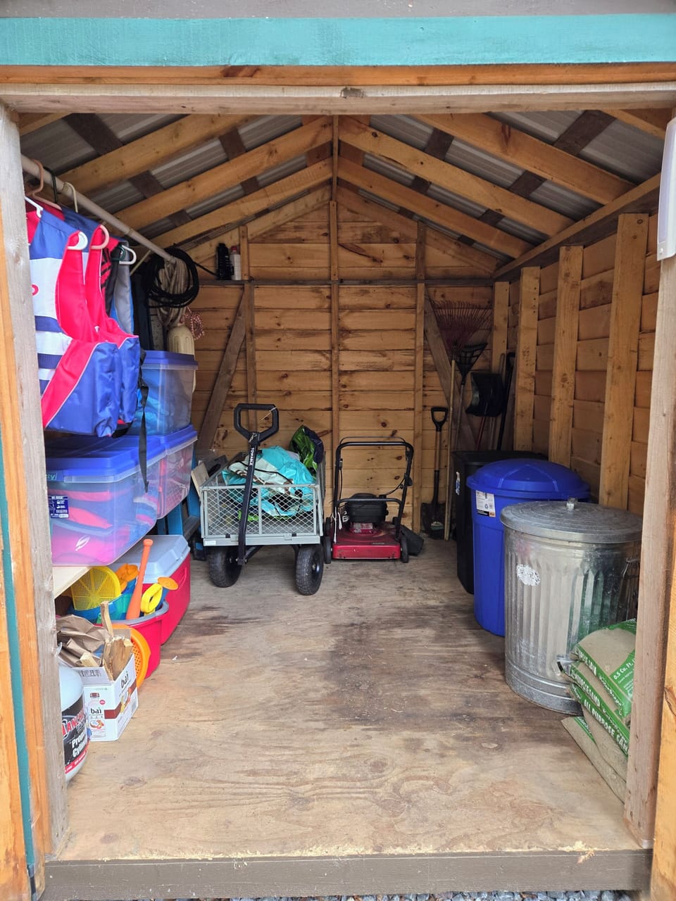 Swim floats, life jackets, beach toys, cooler