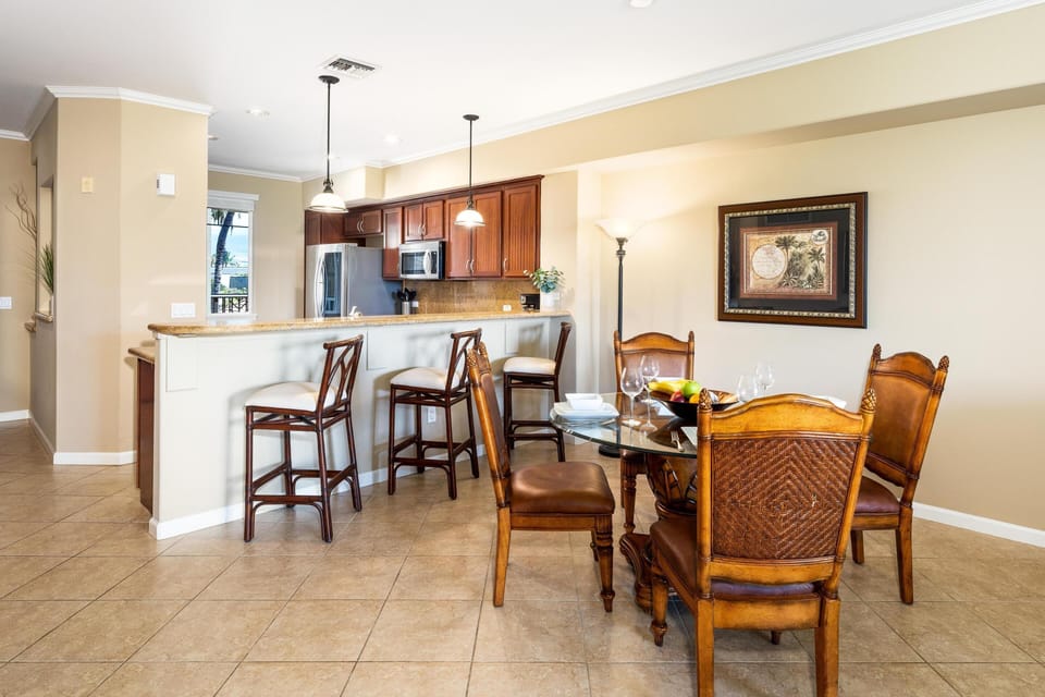 Dining area with seating for four and breakfast bar