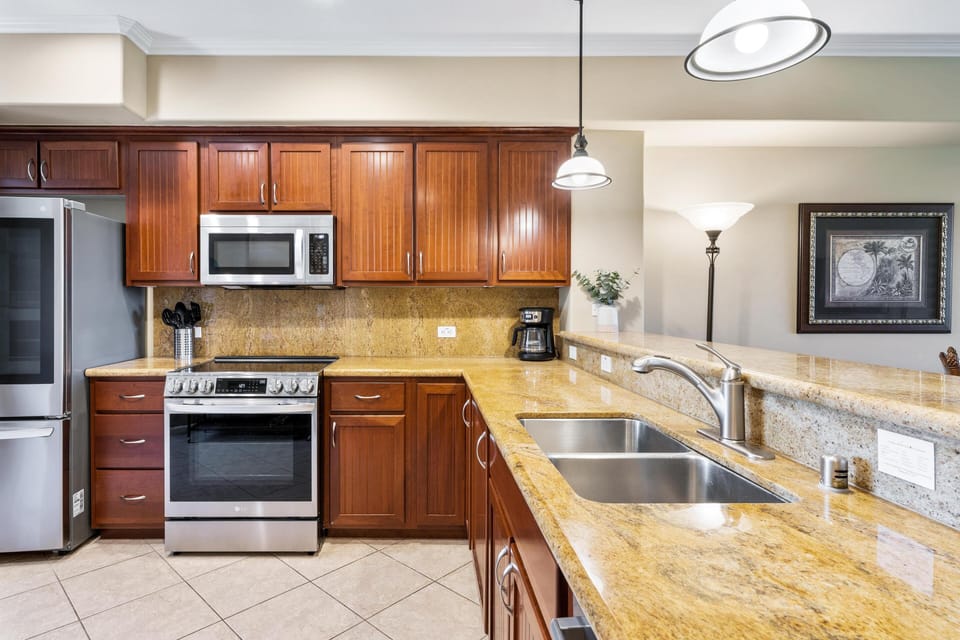 Full kitchen with granite countertops and stainless steel appliances