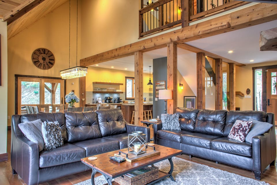 Living Area w/ Luxury Furnishings & Deck Access
