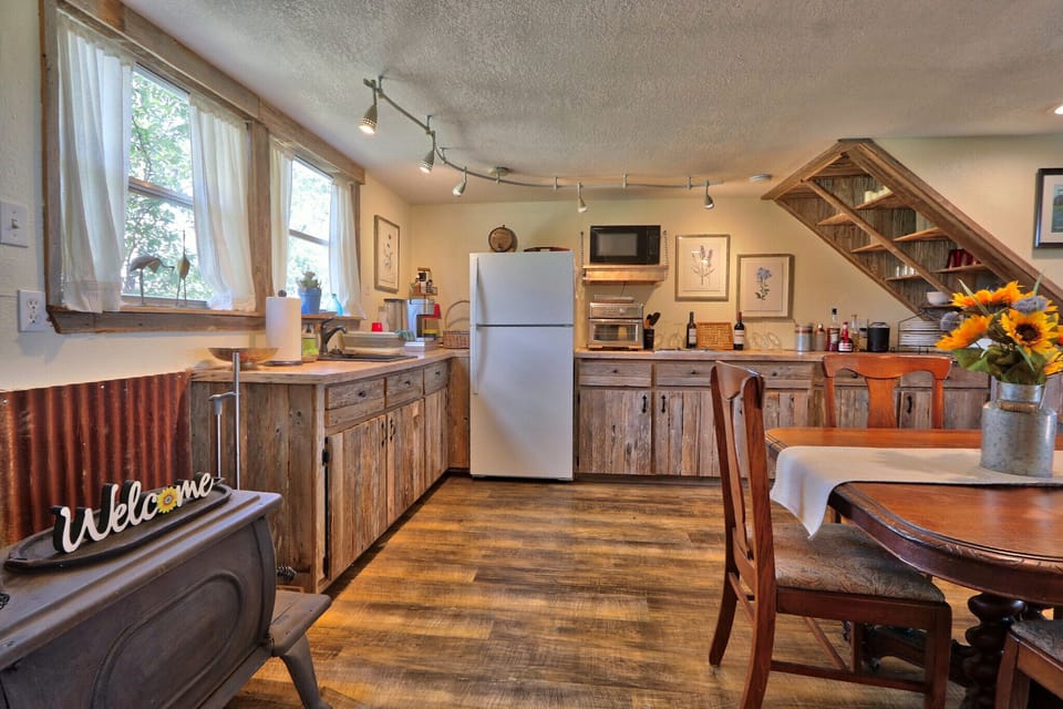 Kitchenette area with a full size refrigerator