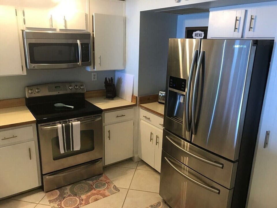 Kitchen with Stainless Steel appliances.