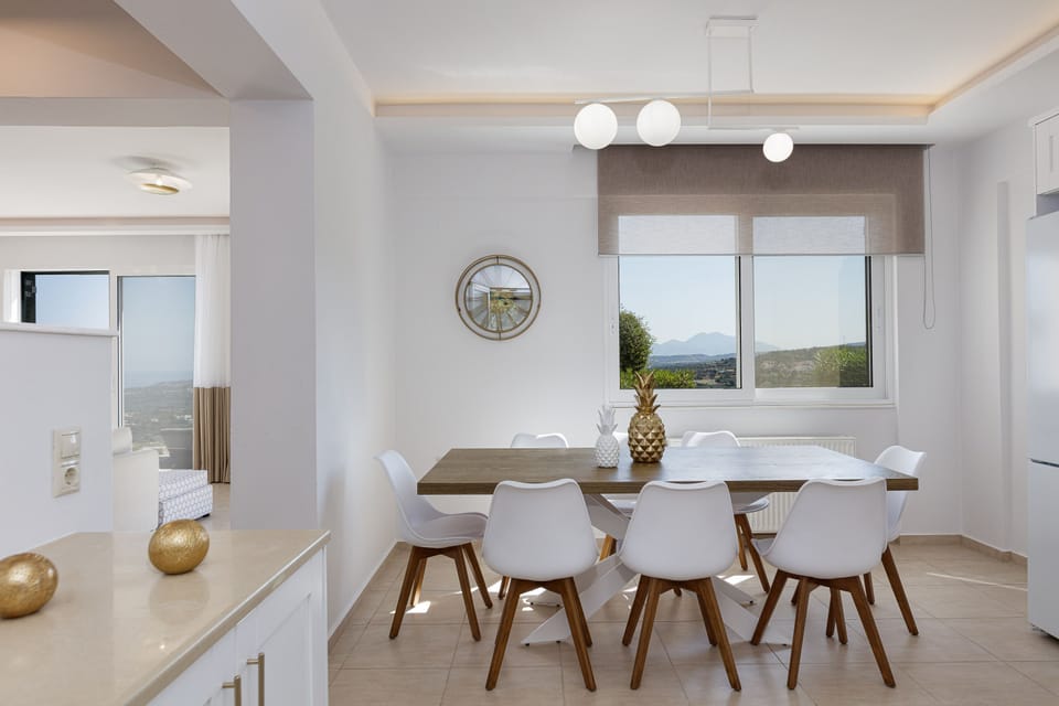The open plan kitchen-dining area.
