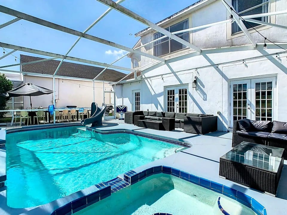 Exclusive Outdoor Oasis - Relax in our private pool with enchanting waterfalls and eclectic lighting. Play basketball with our pool basketball hoop or slide down the water slide. Unwind in the hot tub and enjoy a fine glass of wine by the Fire Pit.
