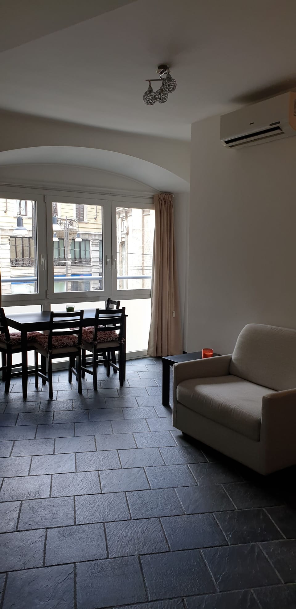 City Apartment | Living area | 32-inch flat-screen TV with cable channels, TV