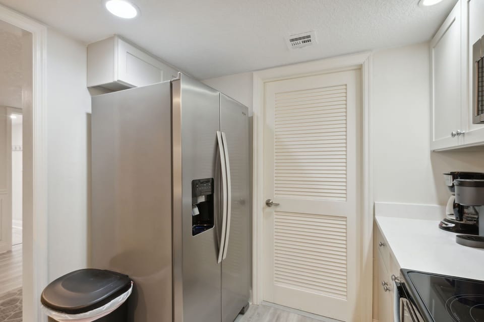 Updated Kitchen with Stainless Steel Appliances and Quartz Countertops