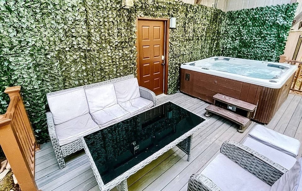 THIS DECK IS LOCATED ON THE REAR SIDE OF THE BUILDING, ON THE LOWEST LEVEL