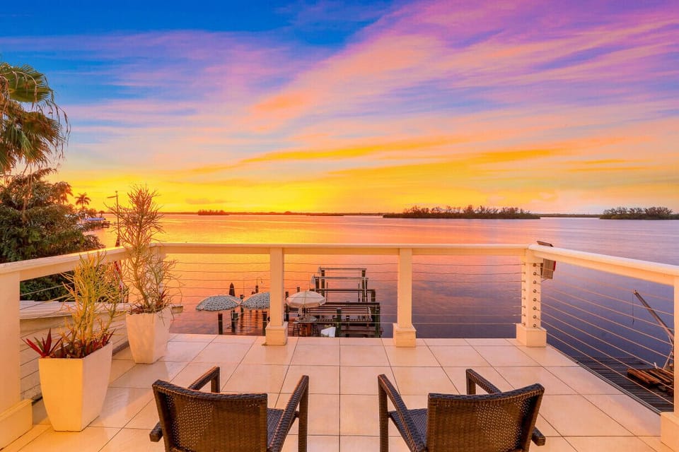 Stunning waterfront views & 3 total patio areas! 
