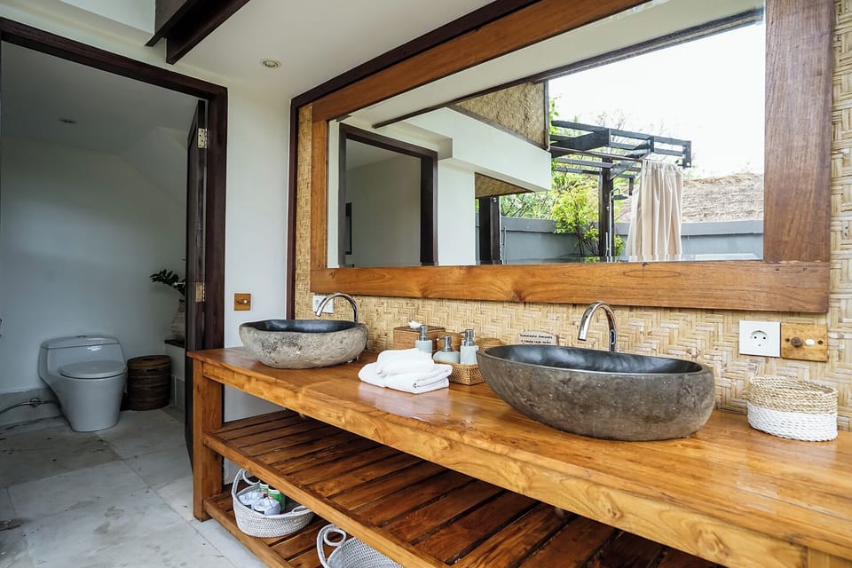 2 Bedroom Oceanside Villa | Bathroom | Shower, rainfall showerhead, free toiletries, hair dryer