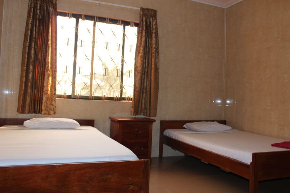 Twin Room (Fan) | Pillowtop beds, desk, free WiFi
