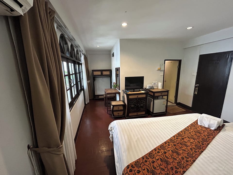 Deluxe Triple Room | In-room safe, individually decorated, blackout drapes, soundproofing